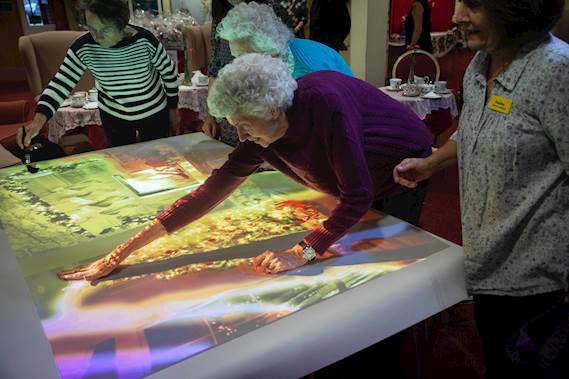 Interactive projection system enhancing lives of people living with dementia